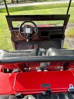 Hummer X4 – Red Power Type: Electric // Seating: 4/6 Passenger Golf cart.