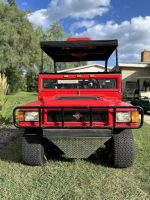 Hummer X4 – Red Power Type: Electric // Seating: 4/6 Passenger Golf cart.